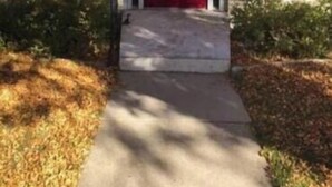 A building with a red door and the number 2415 above it. - HCHideaway-Quiet, Cottagelike!  Pet Friendly!  Queen bed! (Aberdeen)