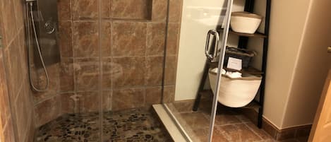Shower, hair dryer, towels, soap