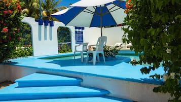 Outdoor pool, sun loungers