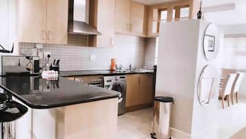 Fridge, microwave, dining tables