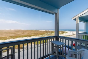 A balcony with a view of the beach and dunes. - Beachside Paradise | Beach Views, Pool & Hot Tub (Corpus Christi)