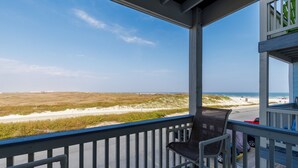 A balcony with a view of the beach and ocean. - Beachside Paradise | Beach Views, Pool & Hot Tub (Corpus Christi)