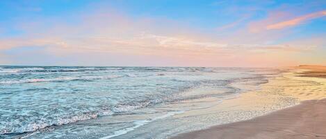 Na praia, toalhas de praia