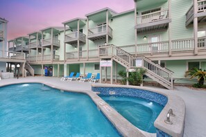 A heated pool, pool loungers