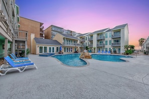 A heated pool, pool loungers