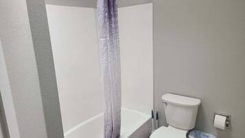 Combined shower/bathtub