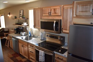 Fridge, microwave, oven, stovetop - Caribou Cabin - Harding's Kenai River Lodge on The Kenai River (Kenai)
