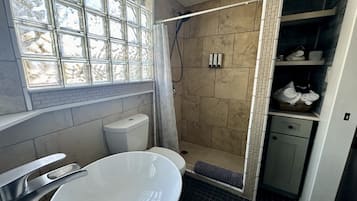 Hair dryer, towels, soap, shampoo