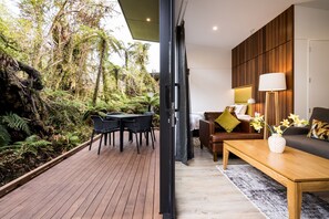 Deluxe Tree Lodge | Living area | LCD TV, heated floors - Rainforest Deluxe (Franz Josef Glacier)