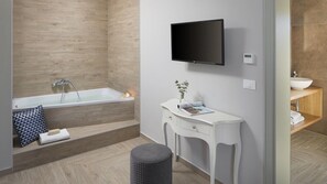 Bathtub, hair dryer, towels