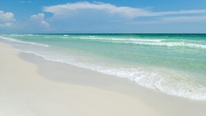 A beach with clear turquoise water and white sand. - Grand Surf 7W! PCB Most Prestigious Address. Huge Condo, Exceptional. (Panama City Beach)