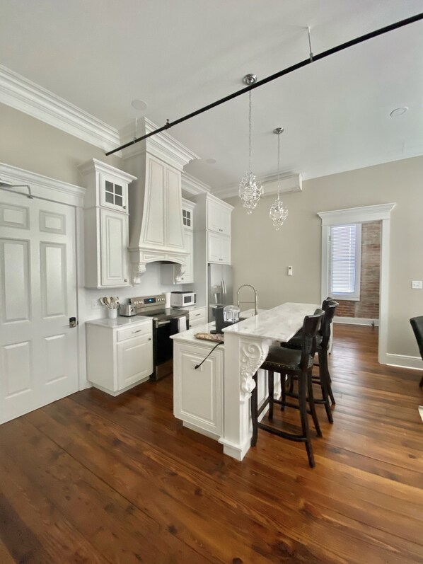 Fridge, microwave, oven, stovetop - Historic downtown apartment on main street  (Crowley)