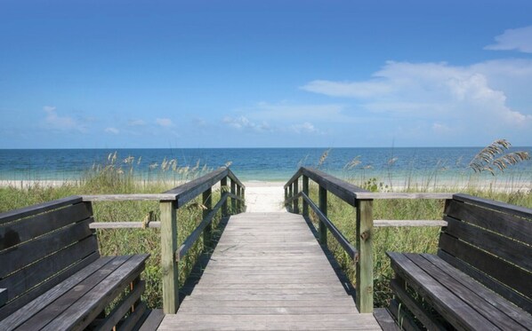 On the beach, sun loungers, beach towels