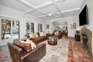 TV, fireplace, books, offices