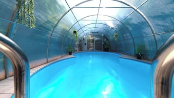 Seasonal outdoor pool, pool umbrellas, pool loungers