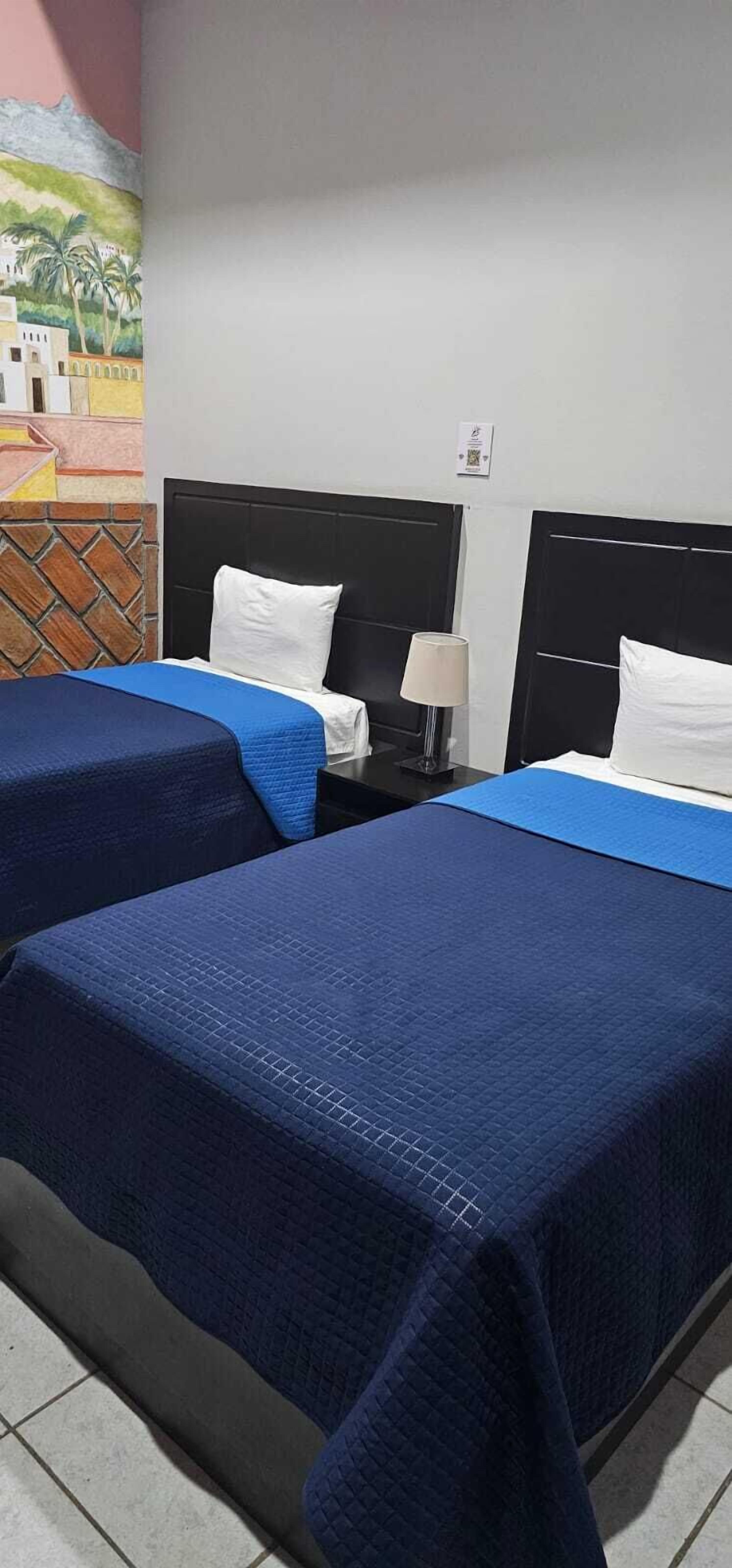 Habitación ejecutiva | Edredones de plumas, decoración individual, mobiliario individual