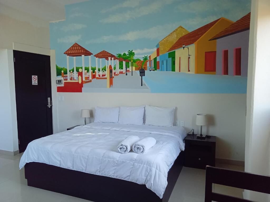 Suite estudio panorámica | Edredones de plumas, decoración individual, mobiliario individual