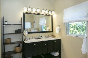 Shower, eco-friendly toiletries, hair dryer, towels