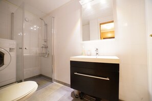 Estúdio conforto | Banheiro | Sabonete, shampoo, papel higiênico 