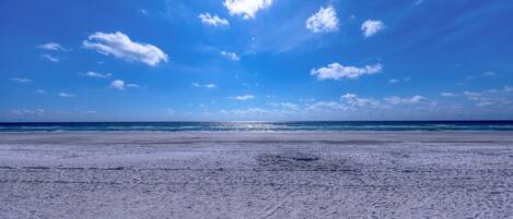 On the beach, sun-loungers, beach towels