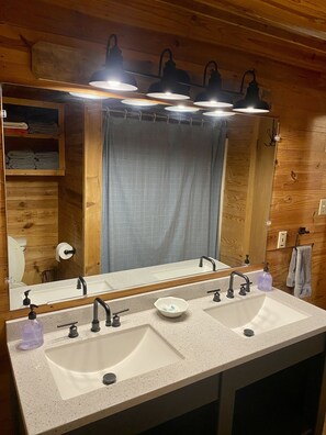 Combined shower/tub, hair dryer, towels, soap