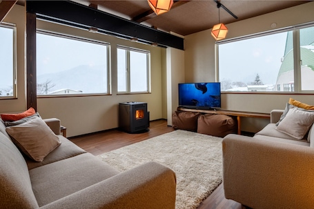 Ni Apartment | Living area | Flat-screen TV, fireplace