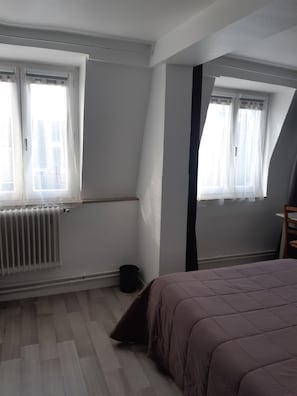 Standard Room | Individually decorated, individually furnished, desk, blackout drapes