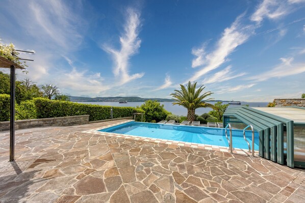 Seasonal outdoor pool, a heated pool