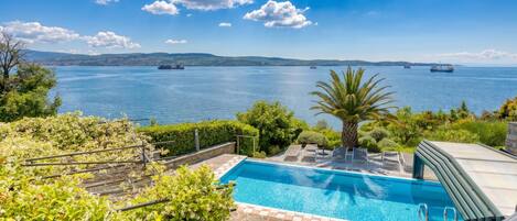 Seasonal outdoor pool, a heated pool