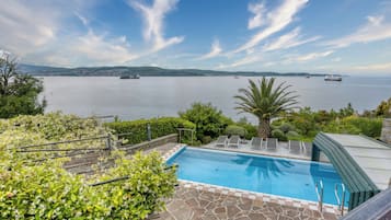 Seasonal outdoor pool, a heated pool