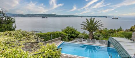 Seasonal outdoor pool, a heated pool