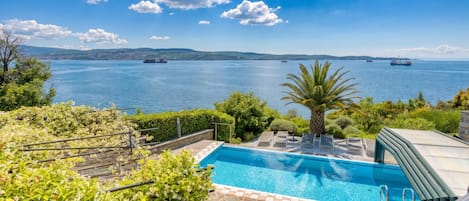 Seasonal outdoor pool, a heated pool