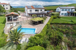 Seasonal outdoor pool, a heated pool