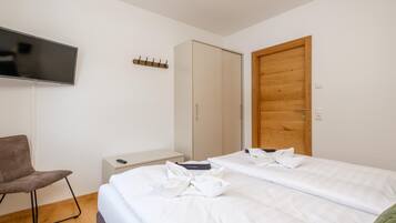 2 habitaciones y ropa de cama