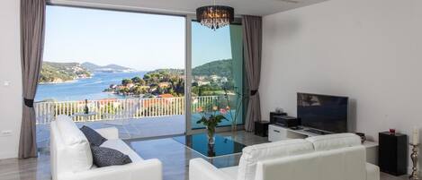 Villa (Five-Bedroom Villa with Private Pool) | Living room | Flat-screen TV