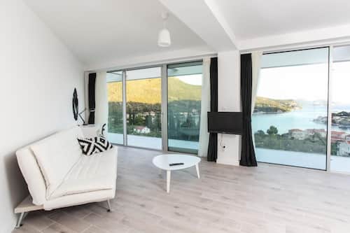 Villa (Five-Bedroom Villa with Private Pool) | Living room | Flat-screen TV