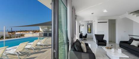 Luxury Villa | Living area | 50-inch LED TV with digital channels, TV