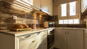 Kaffetrakter/tekoker, mikrobølgeovn, ovn og kokeplater