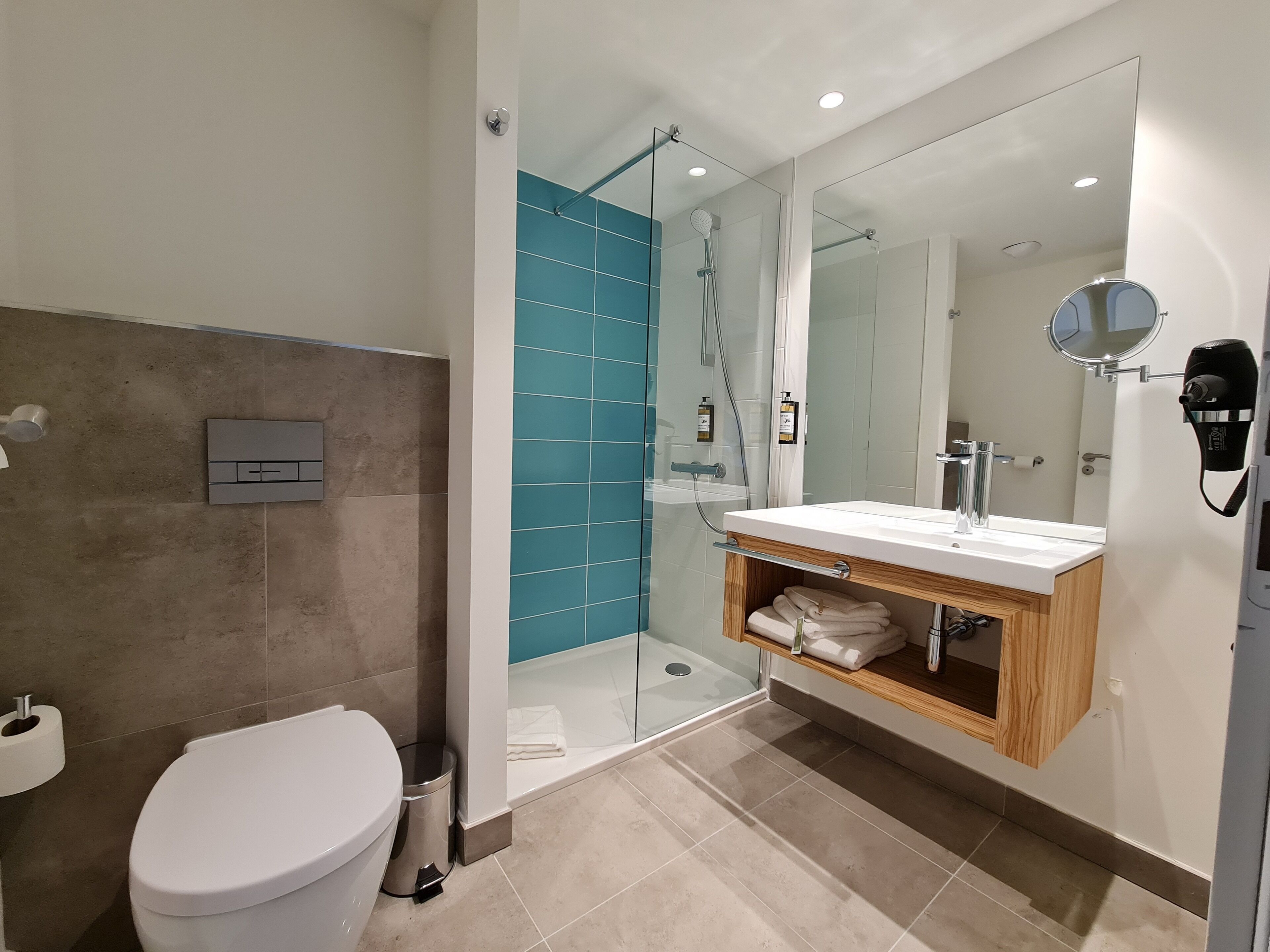 shower, rainfall showerhead, eco-friendly toiletries, hair dryer