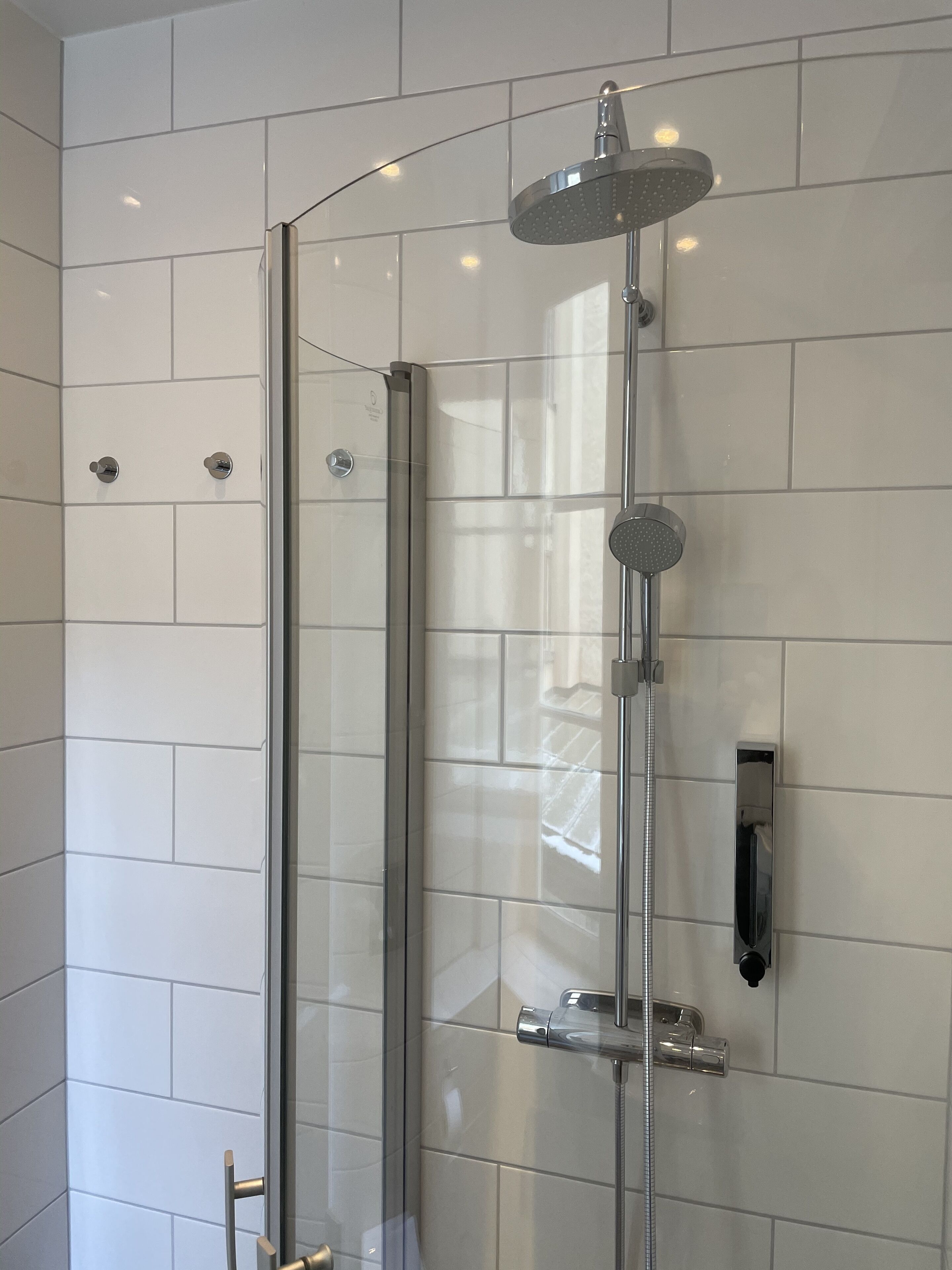 double room | bathroom | shower, rainfall showerhead, hair dryer, heated floors