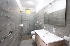 Shower, bidet, toilet paper