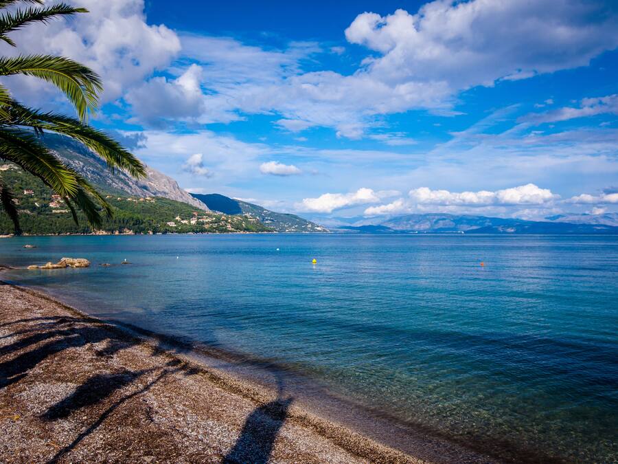 On the beach, sun-loungers, beach umbrellas, beach towels