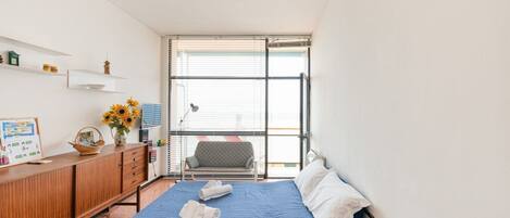 Apartment, 1 Bedroom (Stair access only) | Living room | Flat-screen TV