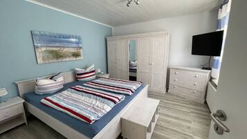 2 slaapkamers, een strijkplank/strijkijzer, reisbedje, wifi