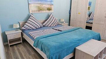 2 habitaciones, tabla de planchar con plancha, cuna de viaje y wifi