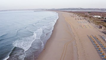 On the beach, white sand