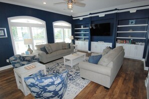 Living area - Enjoy luxury in this 5BR, 5BA home with private pool in Sunset Beach, NC. (Sunset Beach)