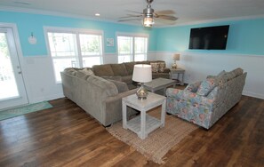 Living area - Enjoy luxury in this 5BR, 5BA home with private pool in Sunset Beach, NC. (Sunset Beach)