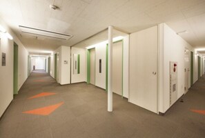 Stylish hallway with doors leading to accommodations.