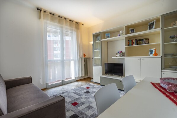 Apartment, 1 Bedroom | Living area | Flat-screen TV